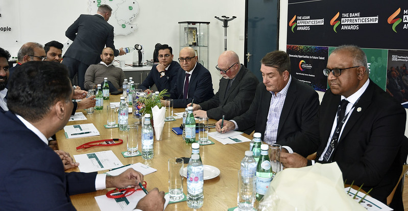 Team and partners in roundtable discussion